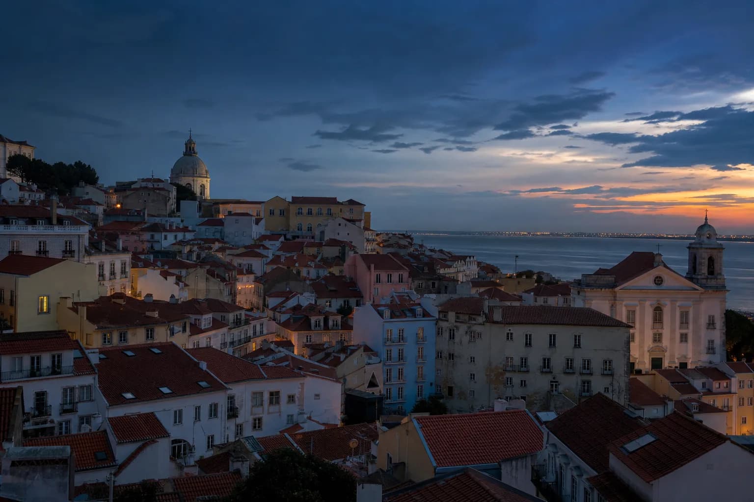 Lisbon hillside architecture at dusk